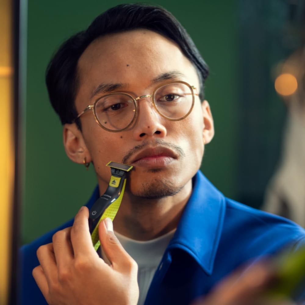 Aparador e Raspador de Pelos Philips OneBlade com 3 Pentes QP2724/10 À prova d'água - Bivolt - Imagem 2